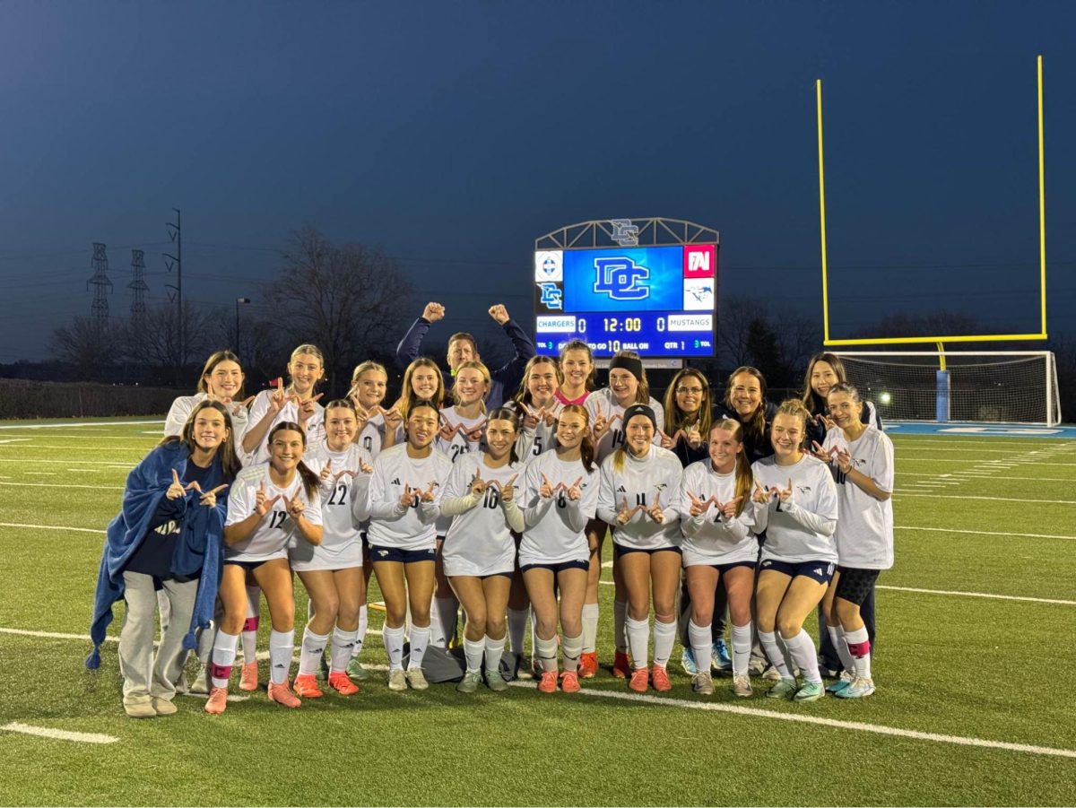 Varsity soccer takes a picture after winning against Dallas Christian.