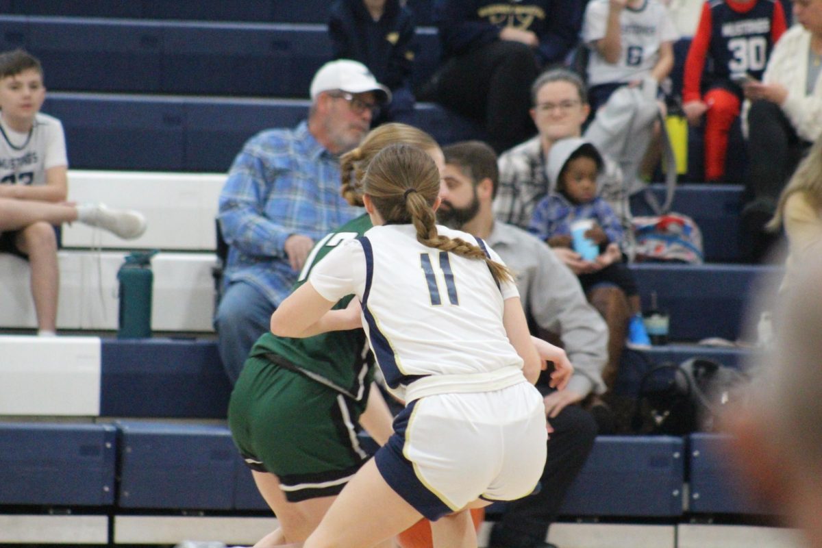 Junior Marit Carlson plays defense.