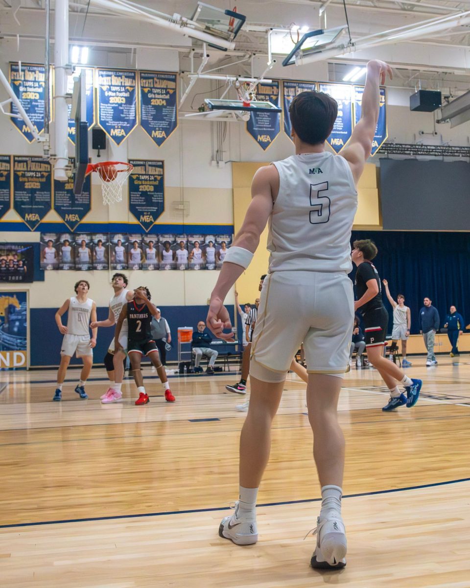 John Clark Shooting a three pointer 