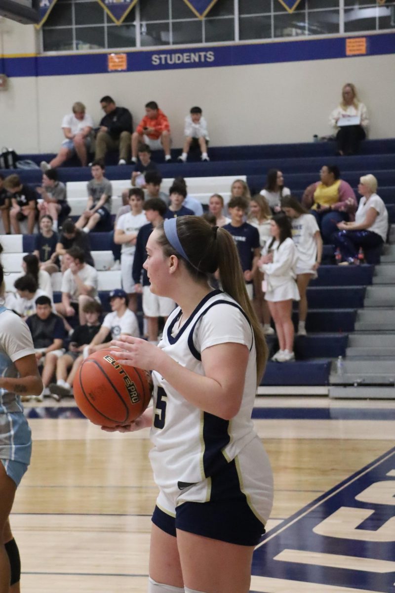 Senior, Hannah Massingale, passes the ball in.