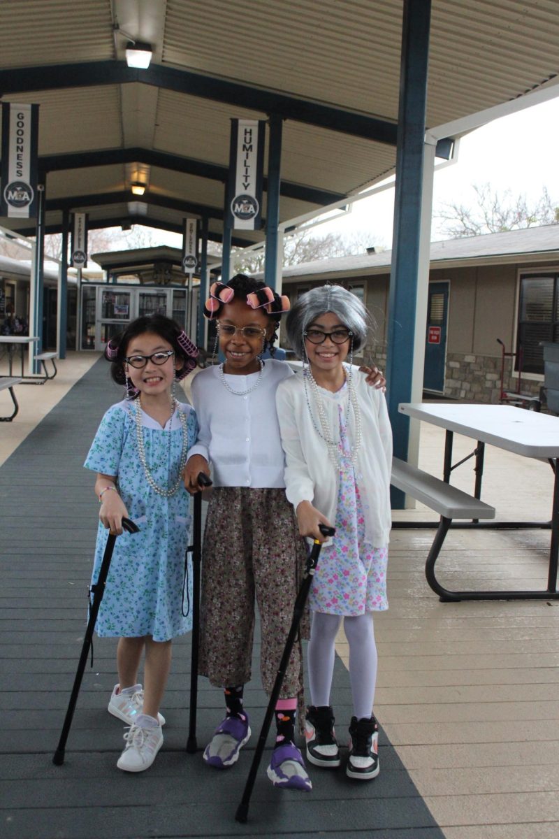 Lower School girls pose for a picture