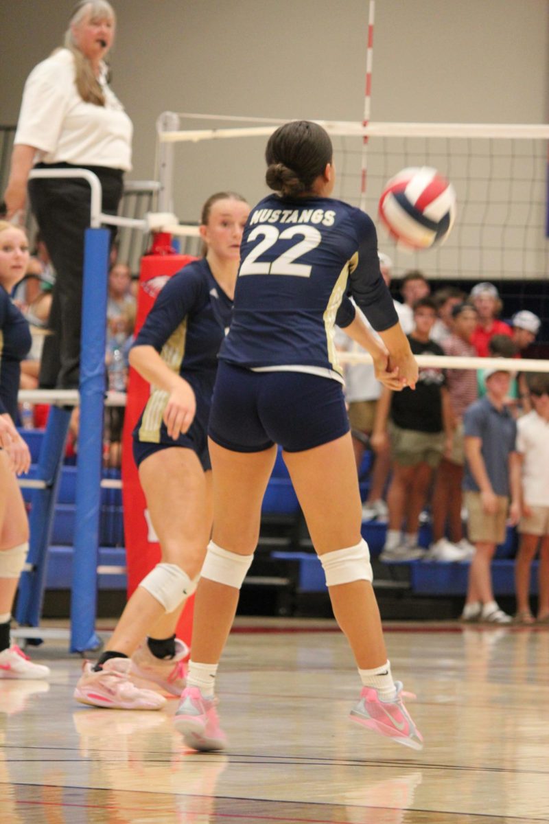 Junior Alexis Guerrero, gets ready and passes a ball.
