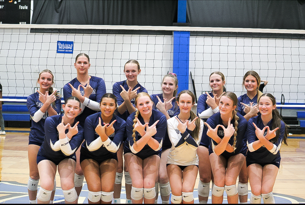 the Lady Mustangs group photo celebrating their win
