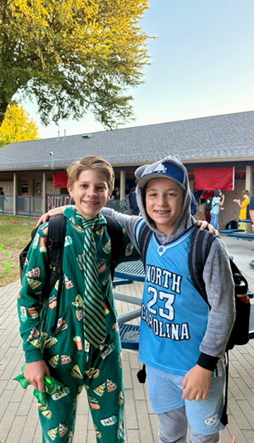 Seventh graders Ethan Hensley and Cam Emley pose for a picture. P