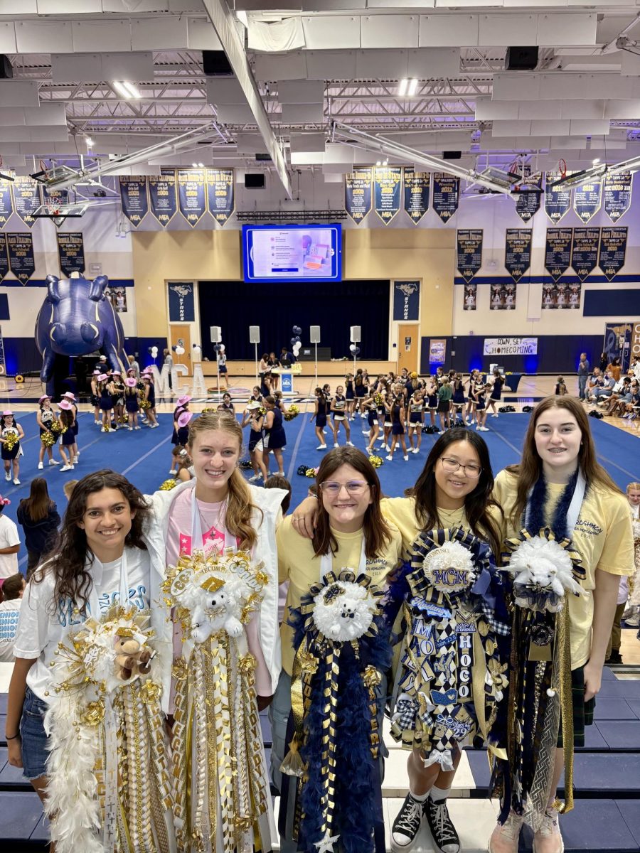 High school girls smile with their mums