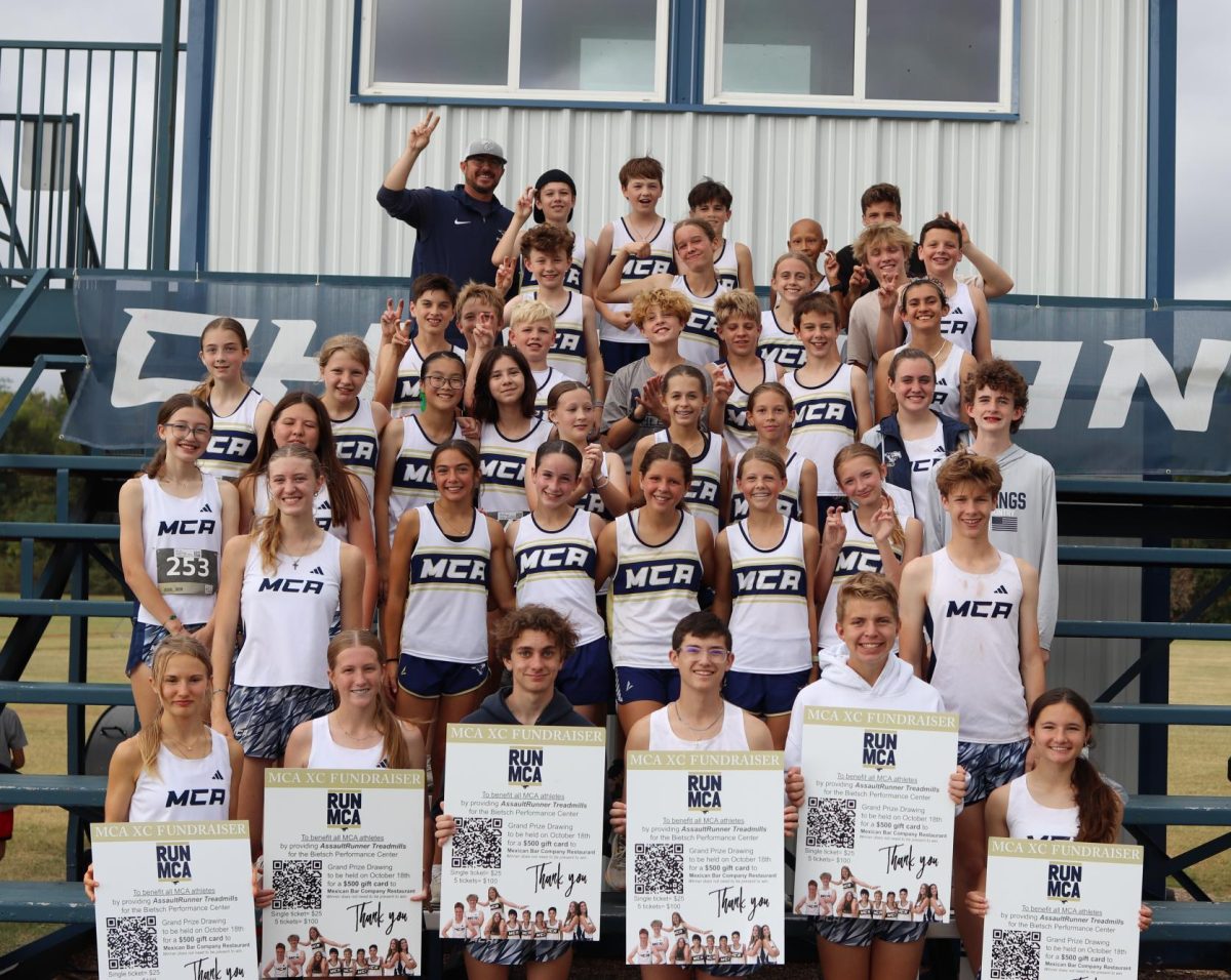 Middle School and Upper School teams get together after their races.