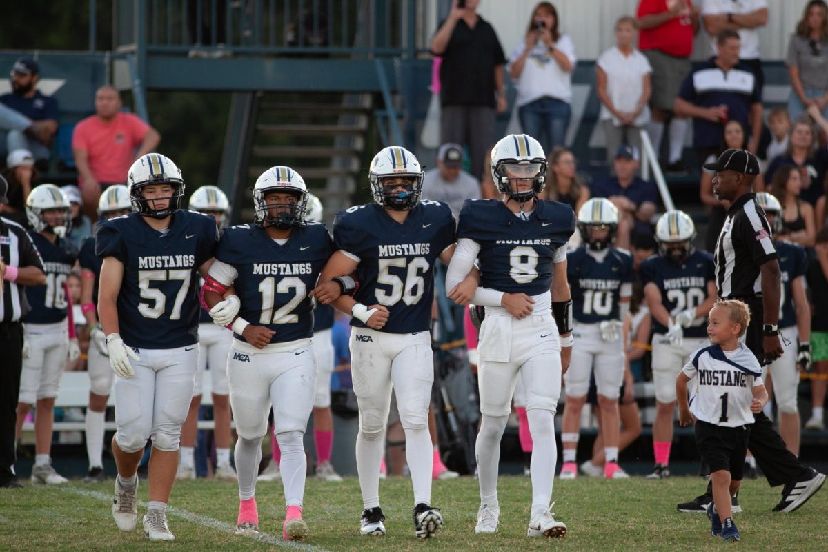 Captains walking to the coin toss 