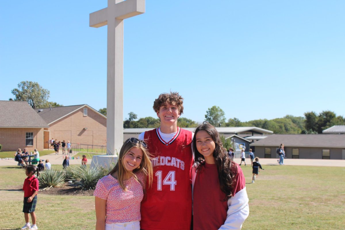 Seniors Makennah Vann, Ben Thomas, and Sophie Dennis dress as High School Musical characters on Monday of Hoco week