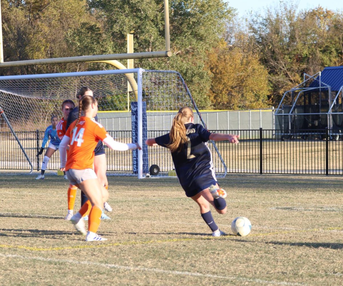 Senior Hannah Doshier shoots for the Mustangs. 