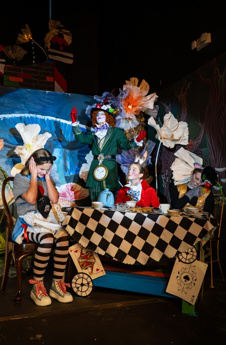 Eighth grader, Crawford McWilliams (Mad Hatter), sings "Twinkle, Twinkle, Little Bat" in the Mad Tea Party scene.