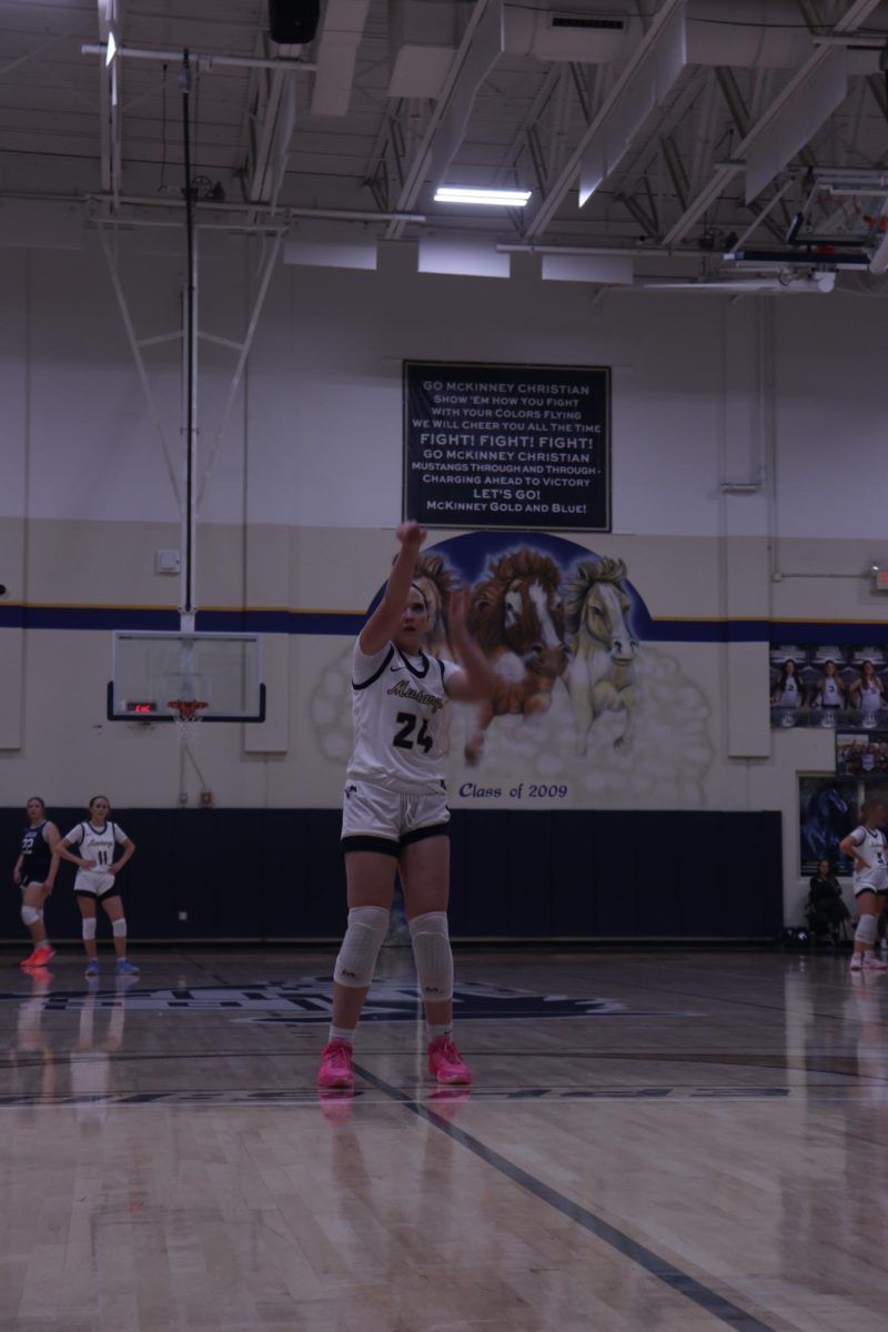Sophomore, Harper Johnson, shoots a free throw.