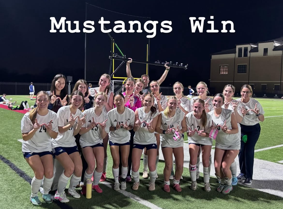 Lady Mustangs throw up W's for the big win.