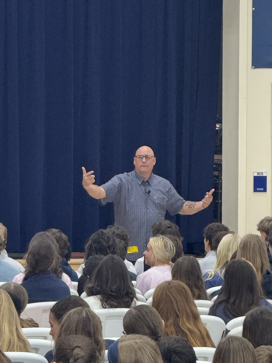 Jon Noyes preaches to the students.