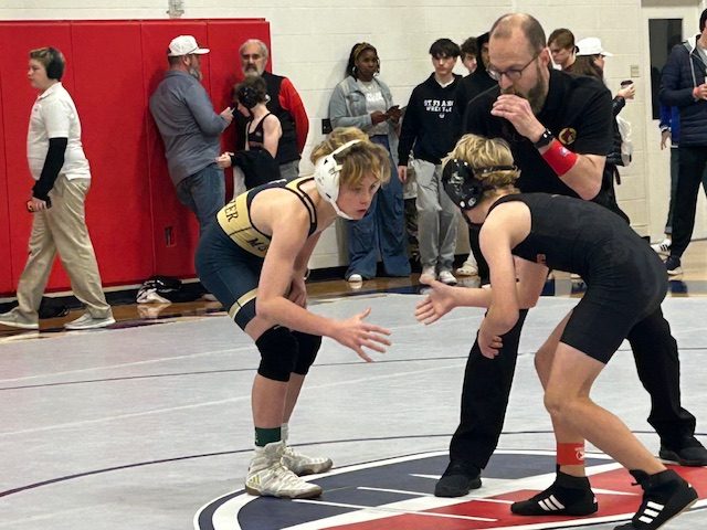 Aidan Schweizer faces off in a match