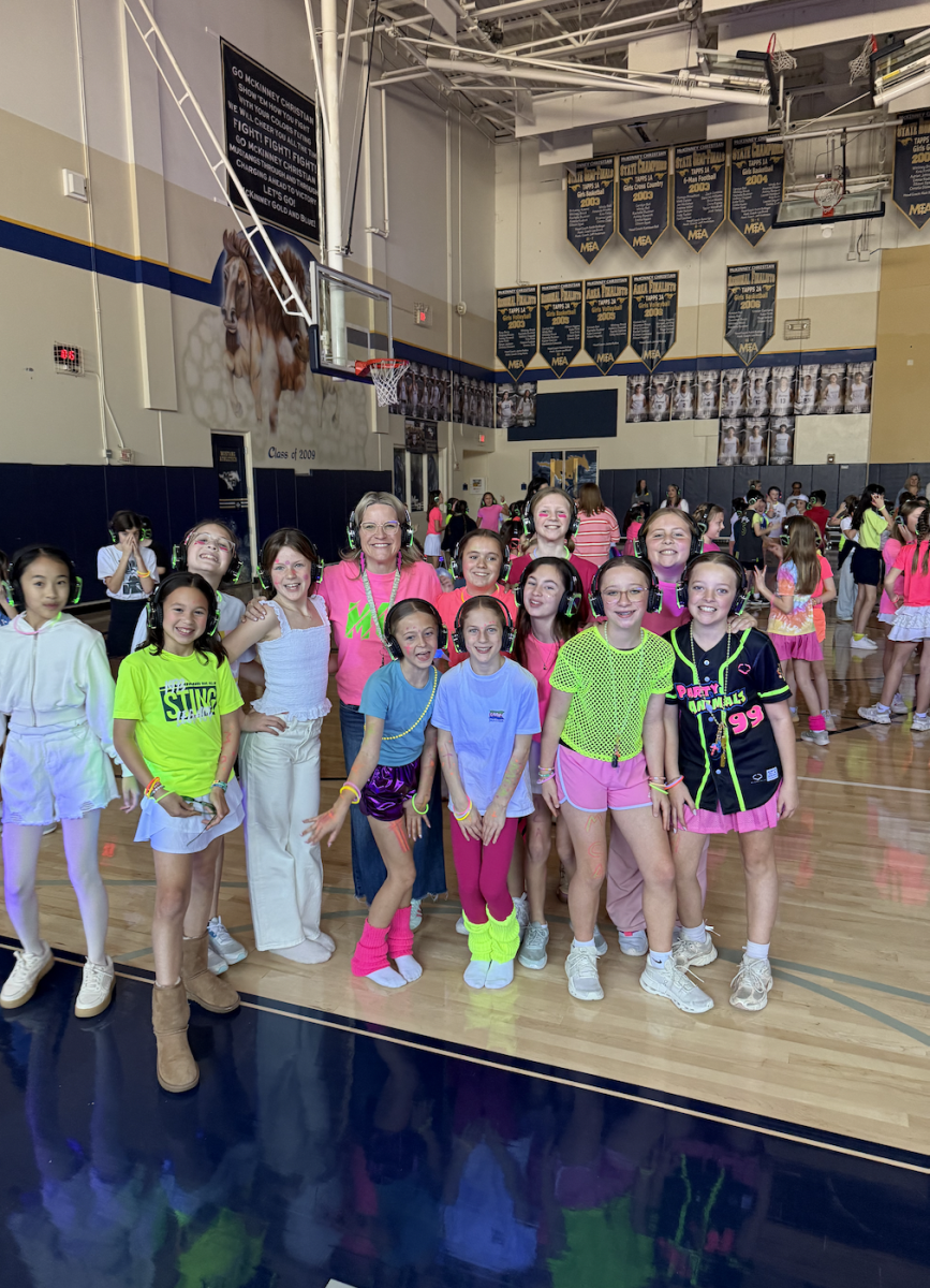 Fifth grade girls join together for a picture.