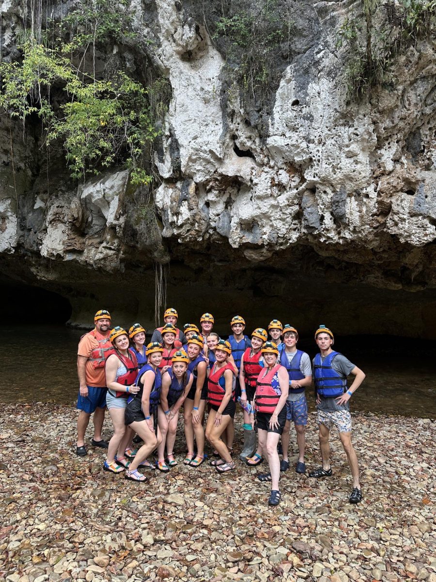 MCA Poses infront of cave