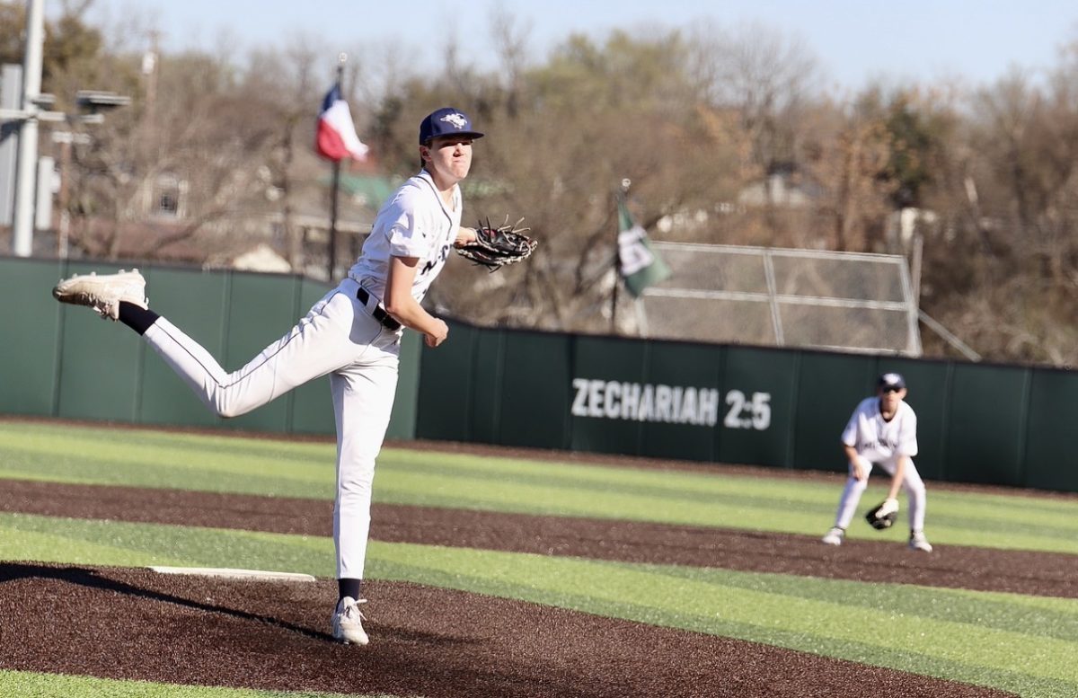 Senior, Ben Thomas, pitching.