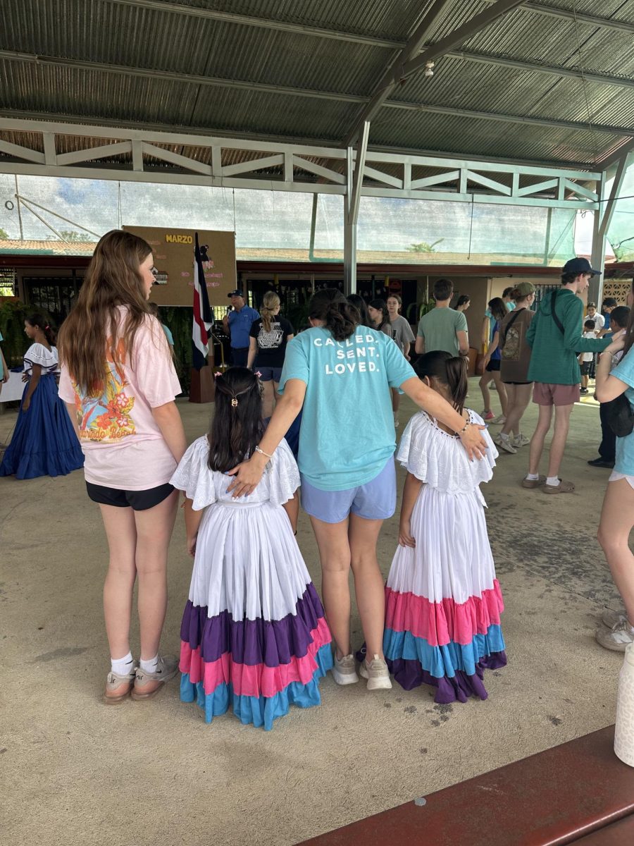 Alexis Guerrero prays for children. 