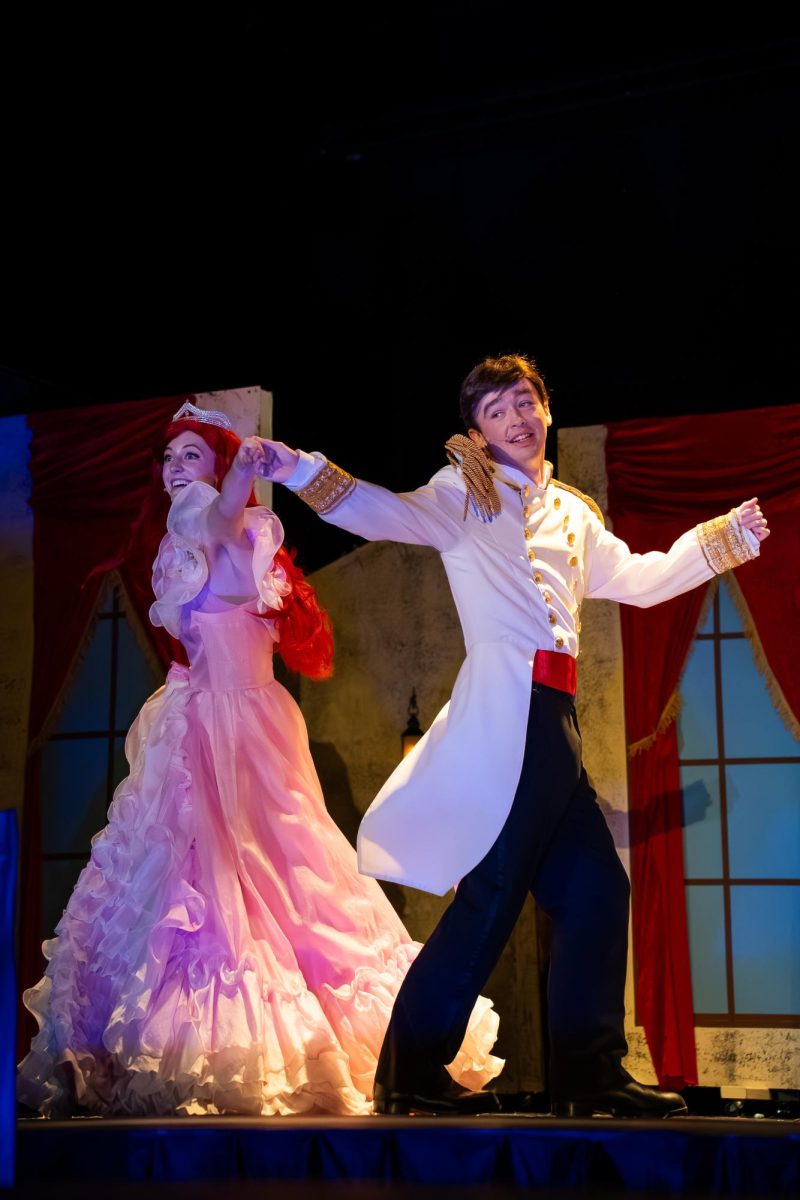 Students dance in the play
