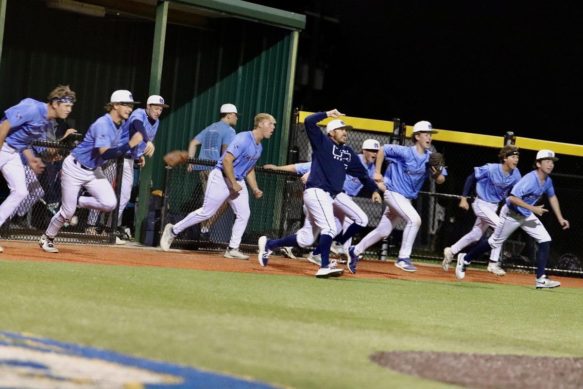 The Mustangs celebrate the Area victory. 