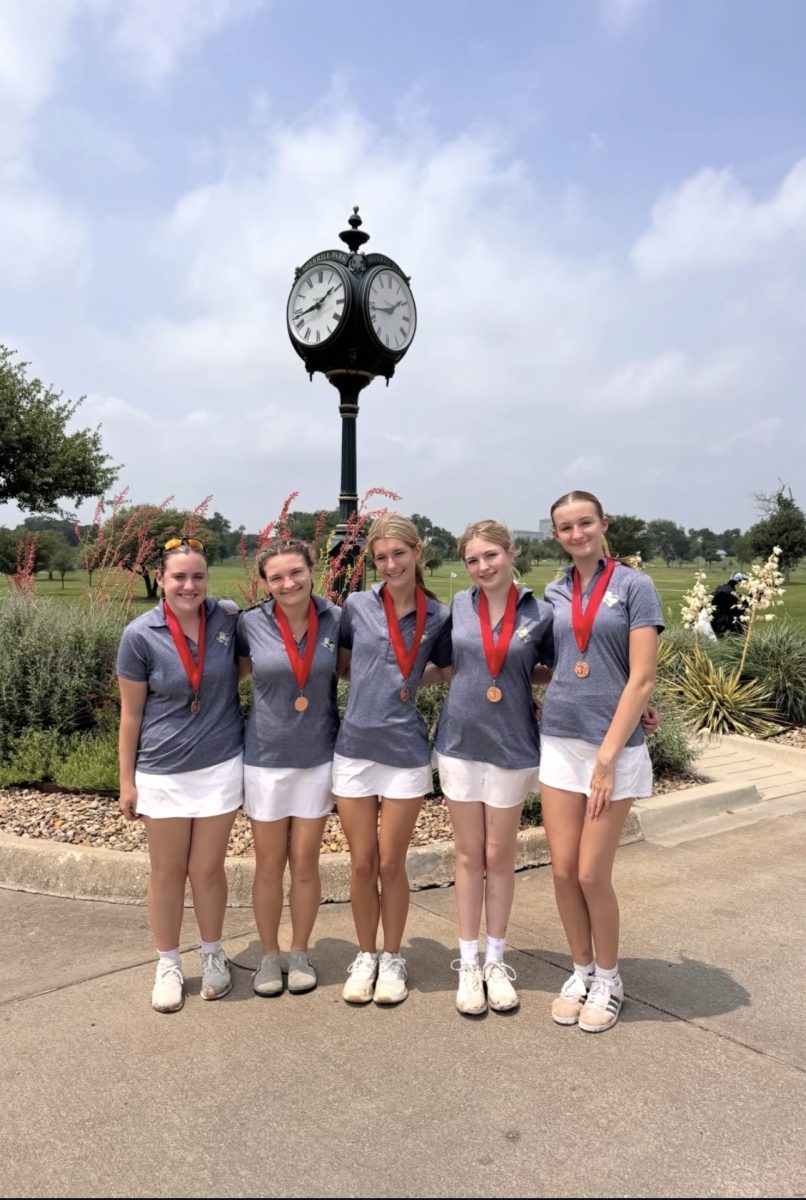 MCA Girls Golf team posing after qualifying