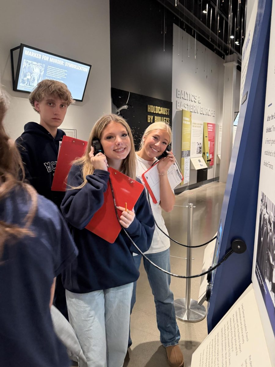 Sophomores Pétra Westra, Brittany Bartoo, and Luke Long join together in hearing different eye witness accounts from the time period.
