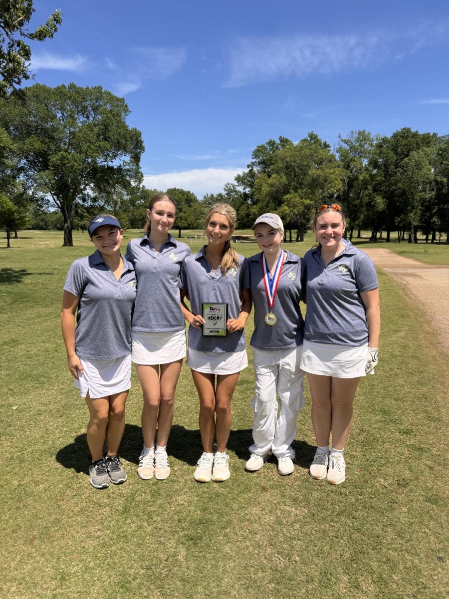 Girls Golf team advances to regionals. 