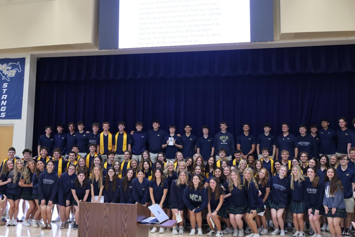 All NHS members pose for a picture.